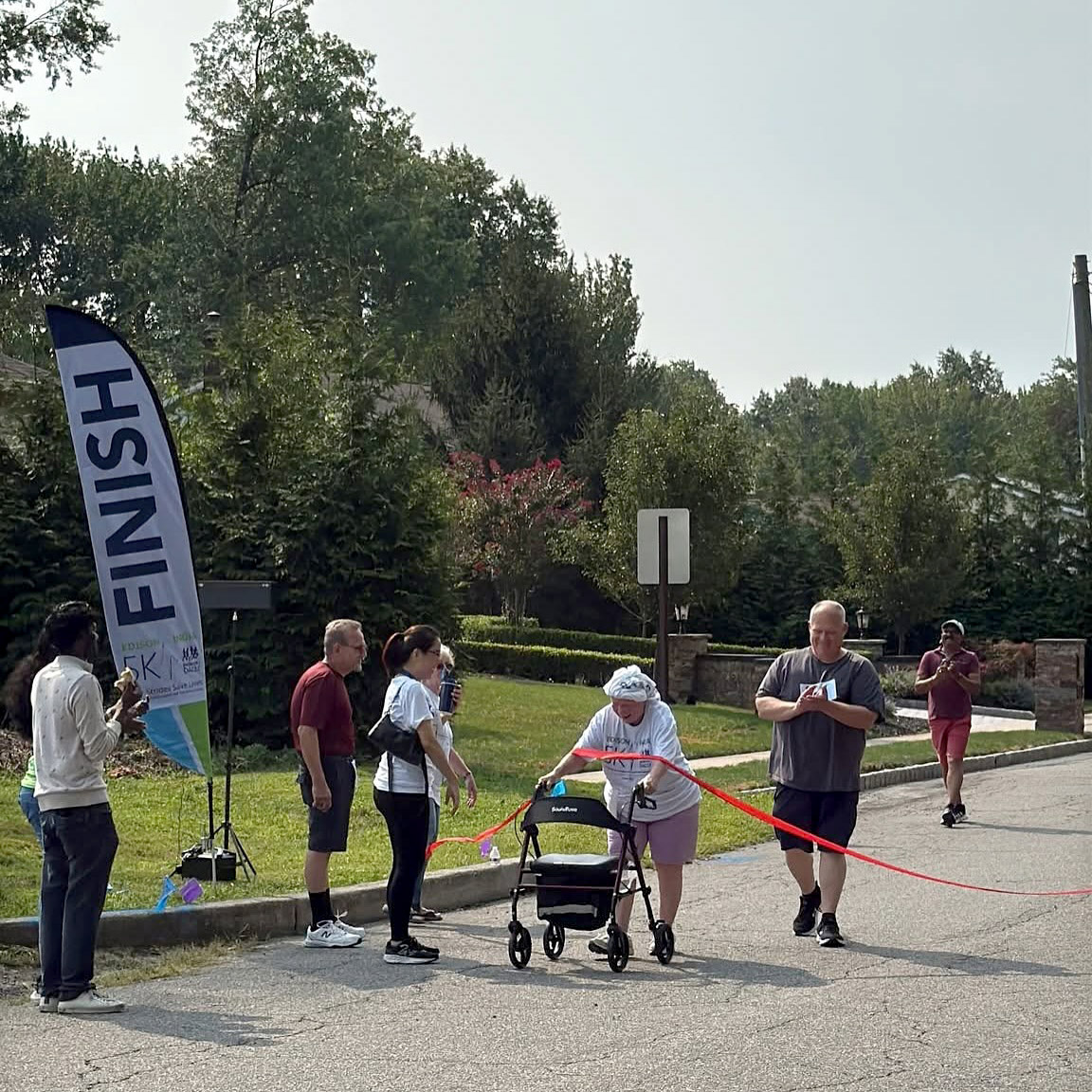 Woman at finish line with walker