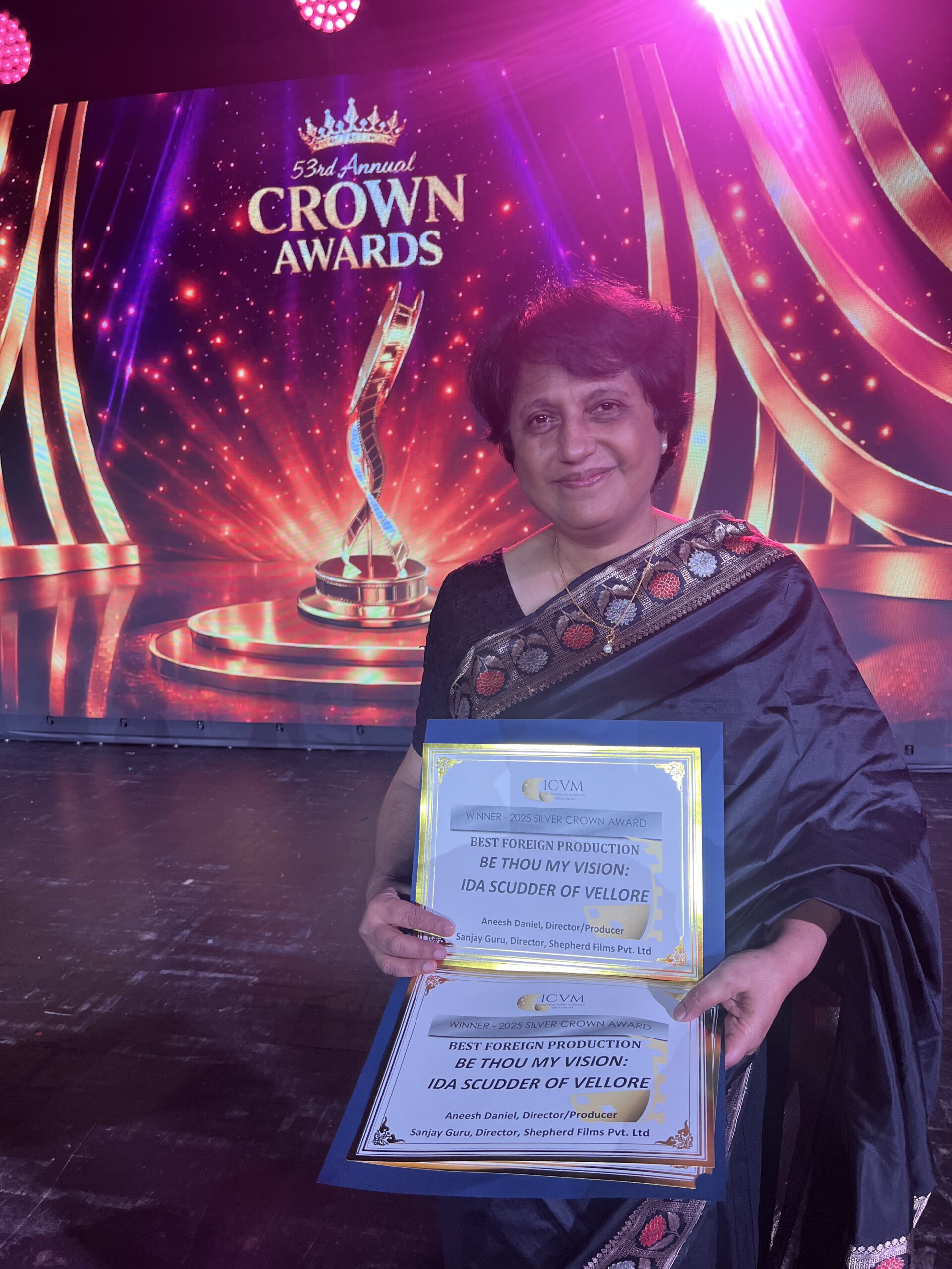 Principal film writer Reena George displays the Silver certificate